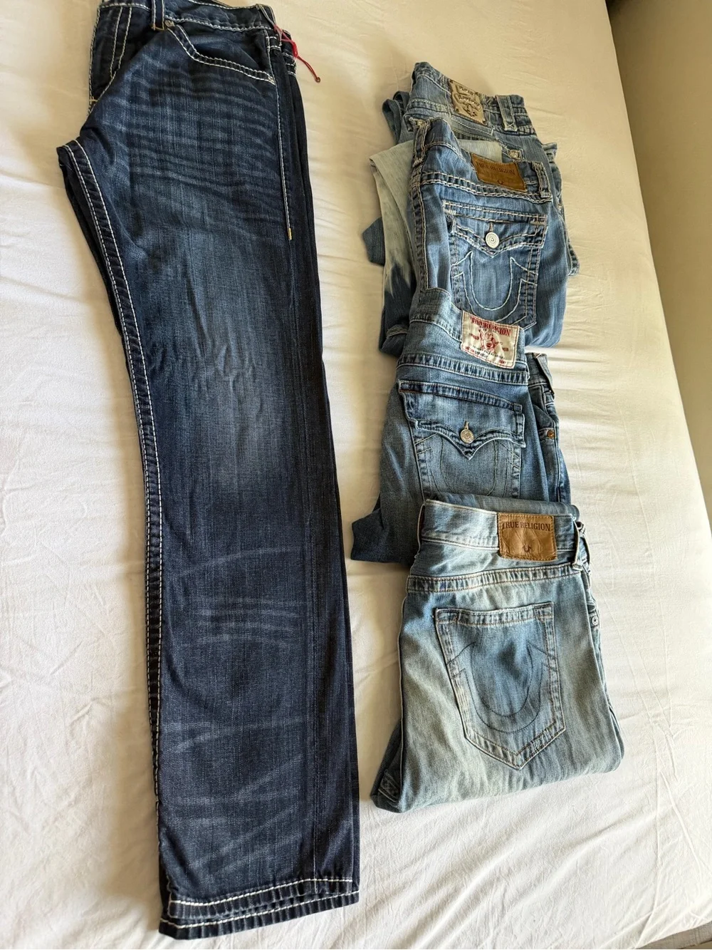 True Religion men’s street cut Jeans in Dark Indigo with Yellow Stitching